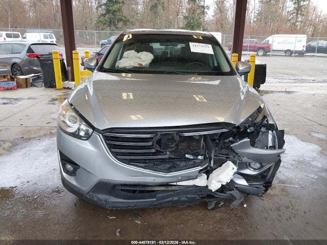 2016 Mazda Cx-5 Touring მანქანა იყიდება აუქციონზე, vin: JM3KE4CY0G0789576, აუქციონის ნომერი: 44579191