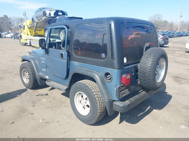 1999 JEEP WRANGLER 1J4FY19S7XP467828 Photo 2