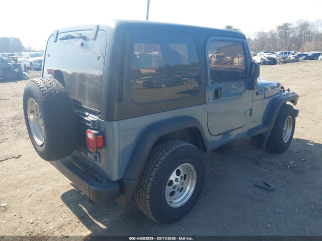 1999 JEEP WRANGLER 1J4FY19S7XP467828 Photo 3