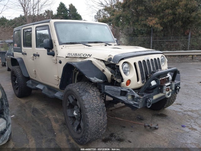 2011 Jeep Wrangler Unlimited Rubicon მანქანა იყიდება აუქციონზე, vin: 1J4BA6H18BL610780, აუქციონის ნომერი: 44587733
