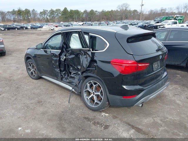 2018 BMW X1 WBXHT3C35J5K30089 Photo 2