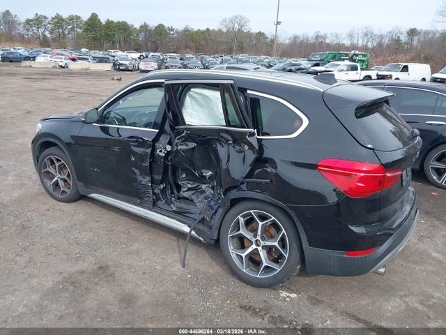 2018 BMW X1 WBXHT3C35J5K30089 Photo 5