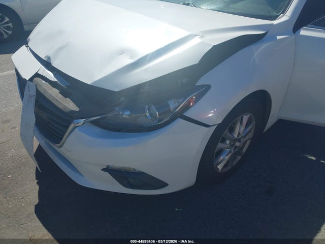 3MZBM1L77GM318309 Mazda Mazda3 I Touring