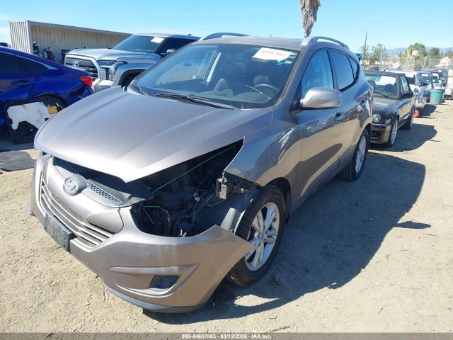 2011 HYUNDAI TUCSON KM8JU3ACXBU157321 Photo 1