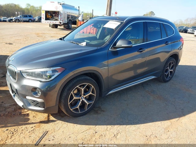 2018 BMW X1 WBXHT3C38J3F04173 Photo 1