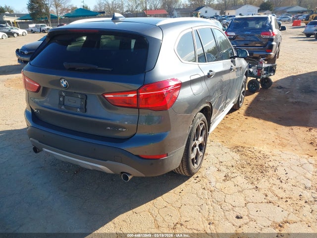 2018 BMW X1 WBXHT3C38J3F04173 Photo 3