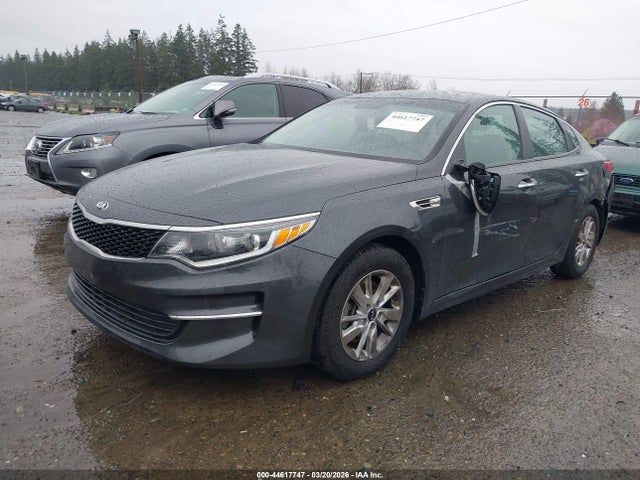 KNAGT4L3XJ5213381 KIA Optima Lx