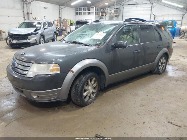 2008 FORD TAURUS X 1FMDK02W08GA30451 Photo 1