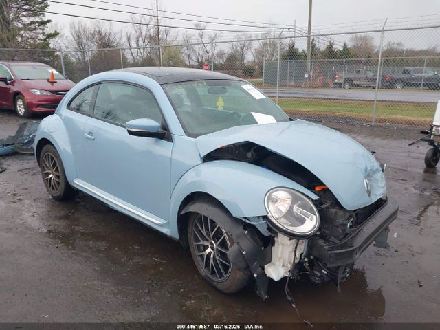 2014 VOLKSWAGEN BEETLE 3VWJP7AT5EM612083