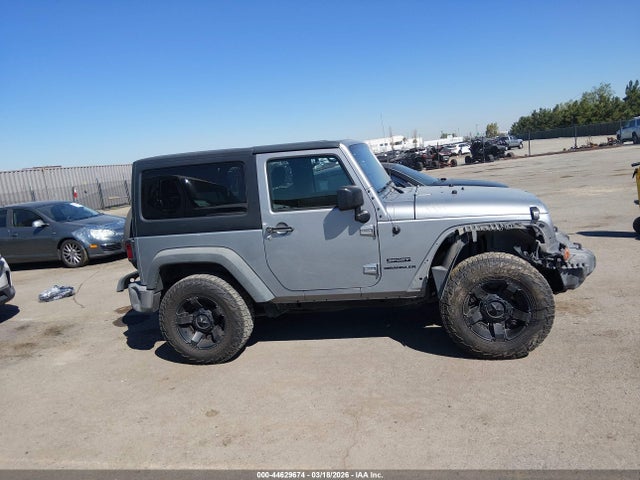 1C4AJWAG6GL178116 Jeep Wrangler Sport