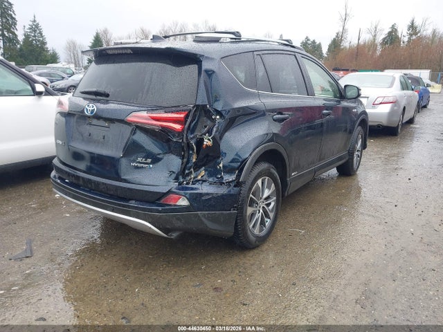 2018 TOYOTA RAV4 HYBRID JTMRJREV9JD231485 Photo 3