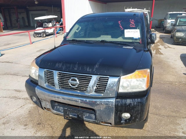1N6BA0ED6FN512274 Nissan Titan Sl