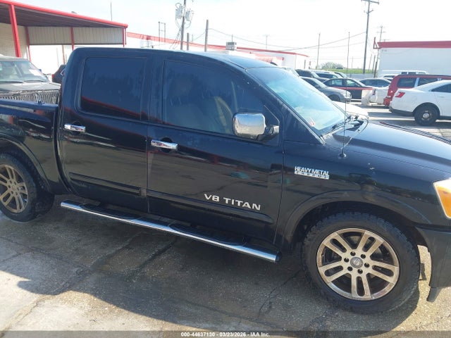 1N6BA0ED6FN512274 Nissan Titan Sl