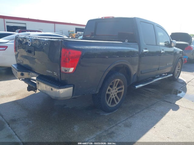 1N6BA0ED6FN512274 Nissan Titan Sl