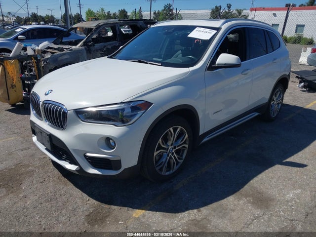 2017 BMW X1 WBXHU7C34H5H33341 Photo 1