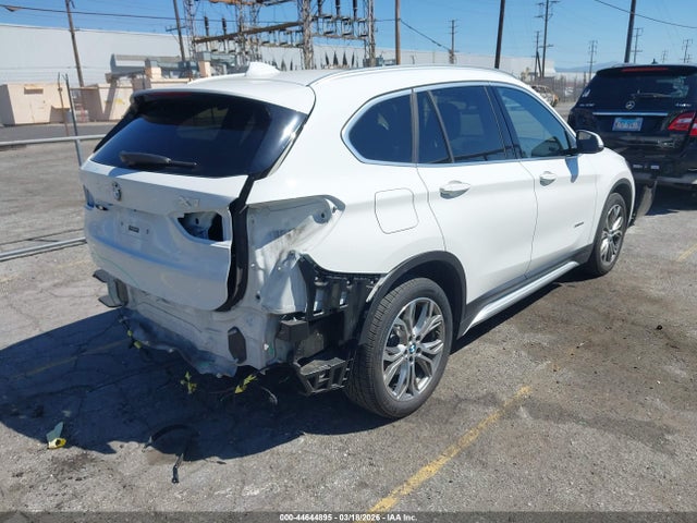 2017 BMW X1 WBXHU7C34H5H33341 Photo 3