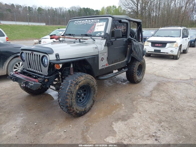 2000 JEEP WRANGLER 1J4FA49S7YP773564 Photo 1