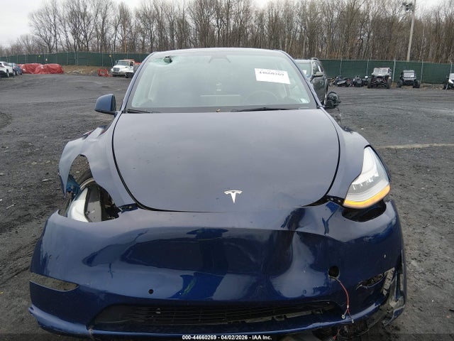 2021 Tesla Model Y Standard Range Rear-wheel Drive მანქანა იყიდება აუქციონზე, vin: 5YJYGDED2MF210804, აუქციონის ნომერი: 44660269