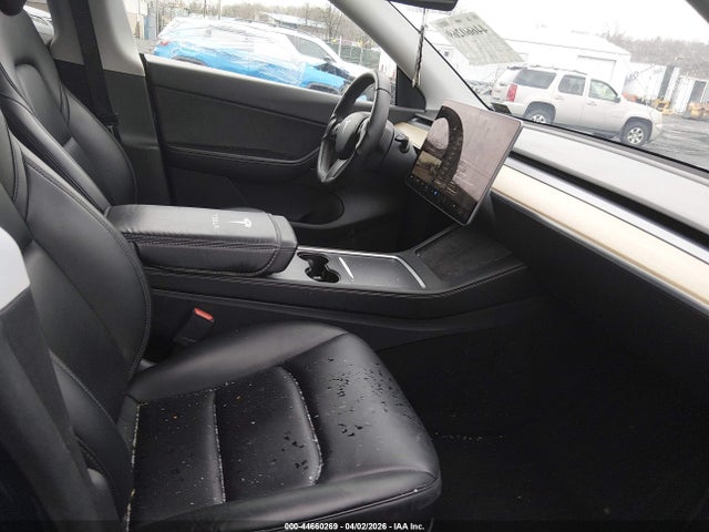 2021 Tesla Model Y Standard Range Rear-wheel Drive მანქანა იყიდება აუქციონზე, vin: 5YJYGDED2MF210804, აუქციონის ნომერი: 44660269