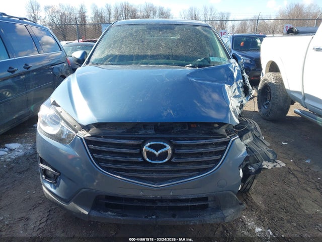 2016 Mazda Cx-5 Touring მანქანა იყიდება აუქციონზე, vin: JM3KE4CY9G0716626, აუქციონის ნომერი: 44661518