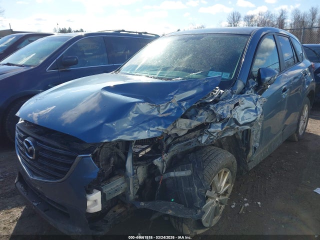 2016 Mazda Cx-5 Touring მანქანა იყიდება აუქციონზე, vin: JM3KE4CY9G0716626, აუქციონის ნომერი: 44661518