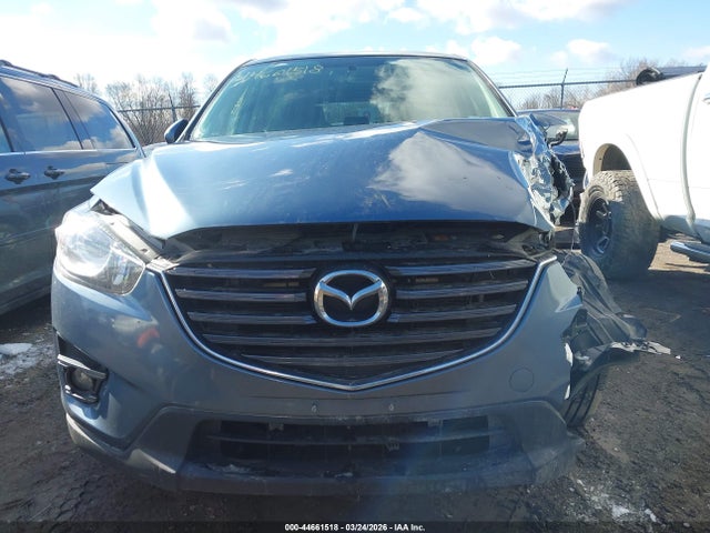 2016 Mazda Cx-5 Touring მანქანა იყიდება აუქციონზე, vin: JM3KE4CY9G0716626, აუქციონის ნომერი: 44661518