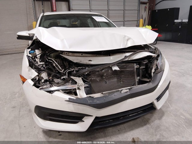 Продажа на аукционе авто 2018 Honda Civic Ex, vin: 19XFC2F76JE033689, номер лота: 44662523