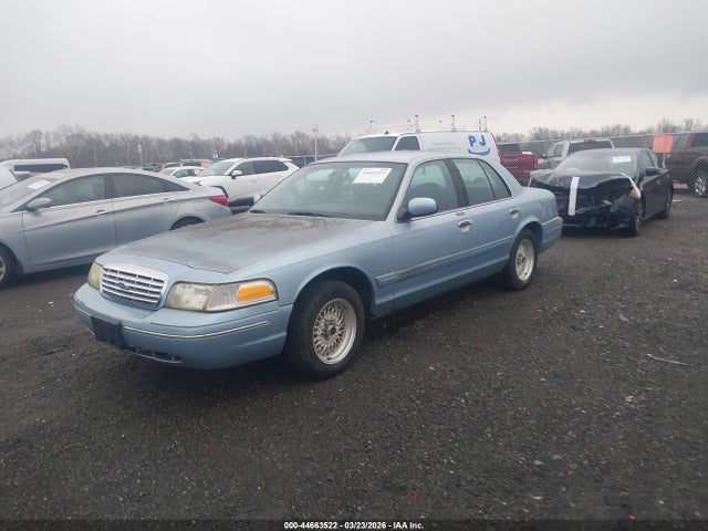 1999 FORD CROWN VICTORIA 2FAFP74W0XX150107 Photo 1