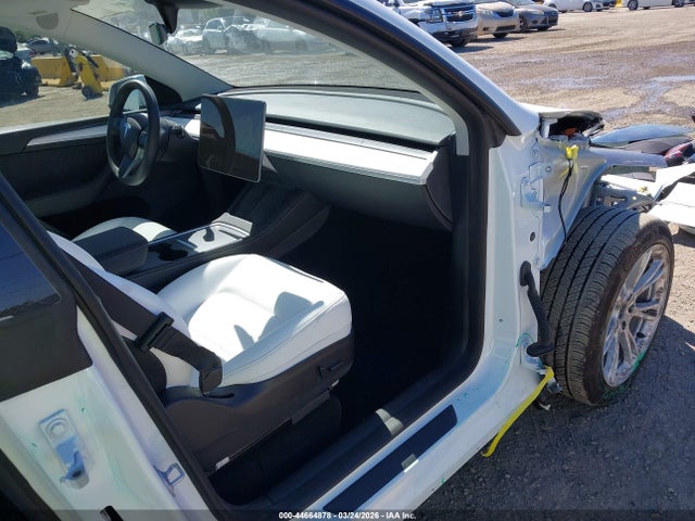 2023 TESLA MODEL Y 7SAYGDEE6PF634048 Photo 4