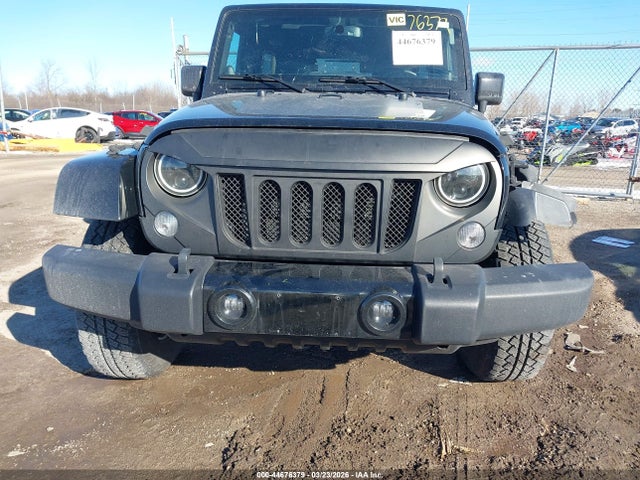 1C4BJWEG5EL310312 Jeep Wrangler Unlimited Altitude