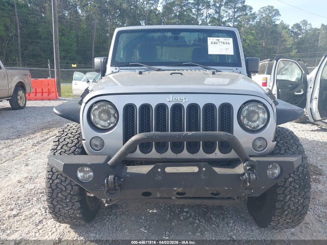 1C4AJWAG9EL156480 Jeep Wrangler Sport