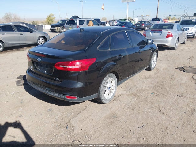 2015 FORD FOCUS 1FADP3F23FL241037 Photo 3