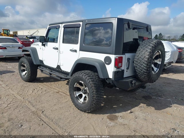 2011 JEEP WRANGLER UNLIMITED 1J4BA6H10BL536027 Photo 2