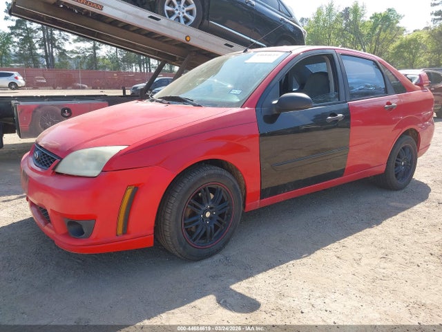 2007 FORD FOCUS 1FAHP34N17W134115 Photo 1