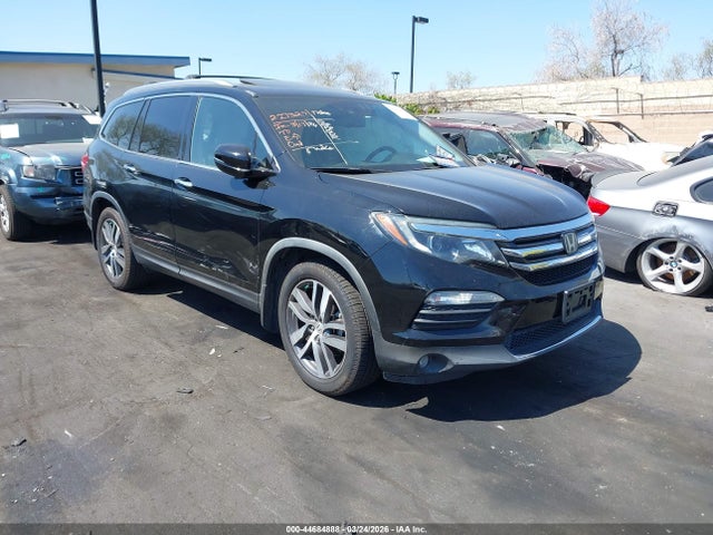 5FNYF6H04HB060868 Honda Pilot Elite