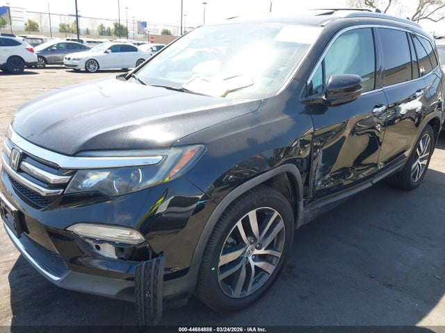 5FNYF6H04HB060868 Honda Pilot Elite