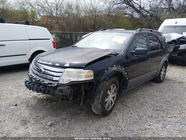 2008 FORD TAURUS X 1FMDK02W78GA29779 Photo 1