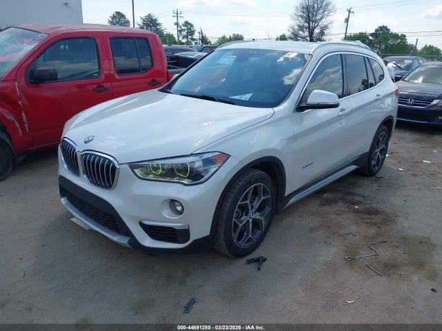 2017 BMW X1 WBXHT3C36H5F84135 Photo 1