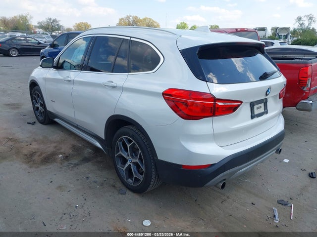 2017 BMW X1 WBXHT3C36H5F84135 Photo 2