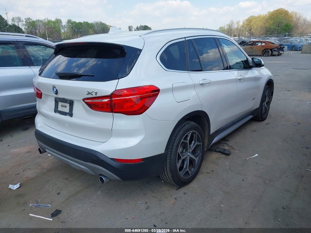 2017 BMW X1 WBXHT3C36H5F84135 Photo 3