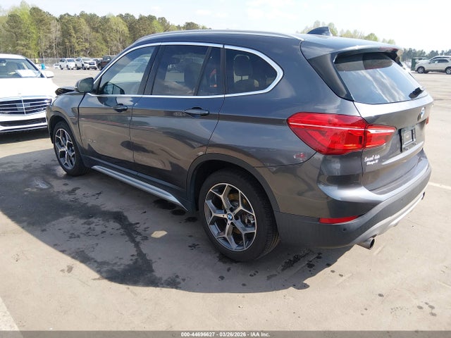 2017 BMW X1 WBXHT3Z36H4A65695 Photo 2