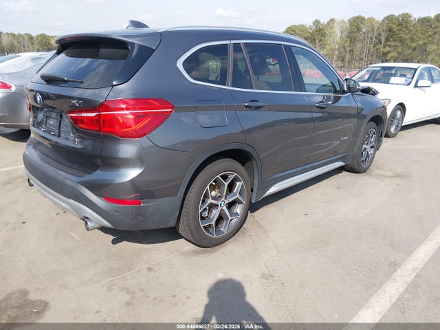 2017 BMW X1 WBXHT3Z36H4A65695 Photo 3