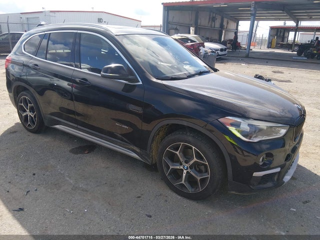 2017 BMW X1 WBXHT3C38H5F77204