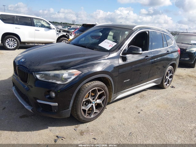 2017 BMW X1 WBXHT3C38H5F77204 Photo 1