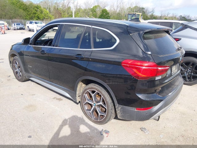2017 BMW X1 WBXHT3C38H5F77204 Photo 2