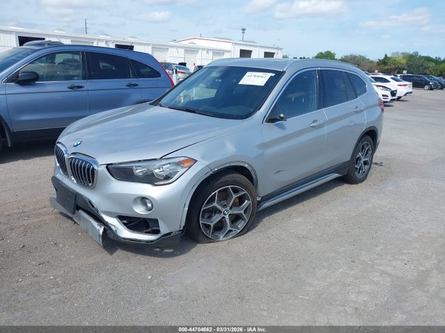 2018 BMW X1 WBXHU7C38J5H41352 Photo 1