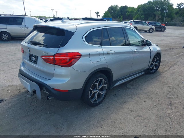 2018 BMW X1 WBXHU7C38J5H41352 Photo 3