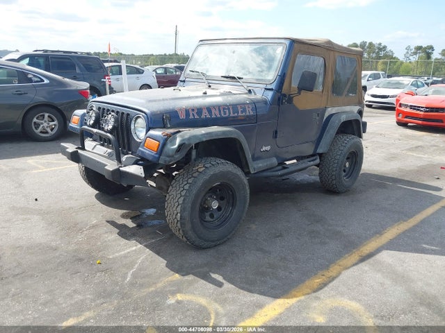 2000 JEEP WRANGLER 1J4FA29P0YP777729 Photo 1