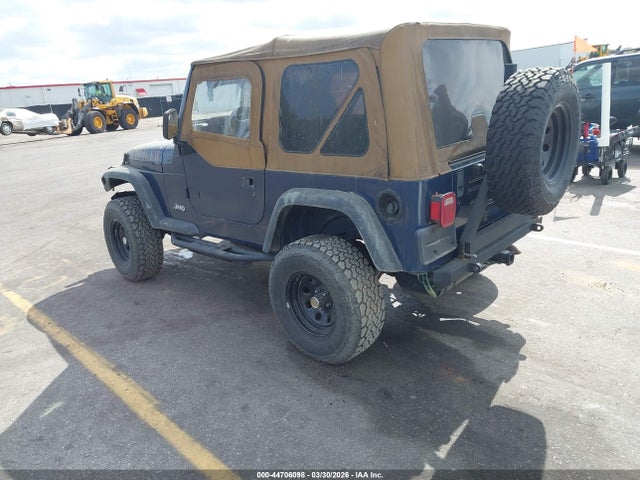 2000 JEEP WRANGLER 1J4FA29P0YP777729 Photo 2