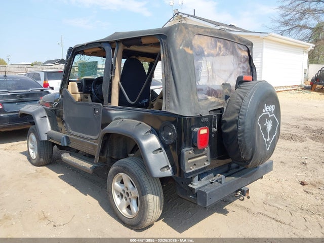 1999 JEEP WRANGLER 1J4FY49S2XP471528 Photo 2